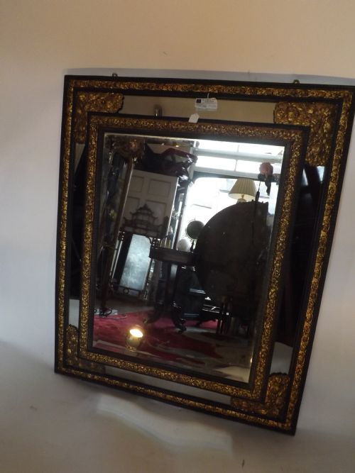 c19th flemish ebonised and giltbrass mounted frame 'cushion' mirror