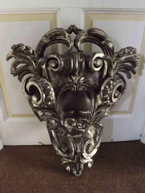 c18th italian carved wood and silvered cartouche