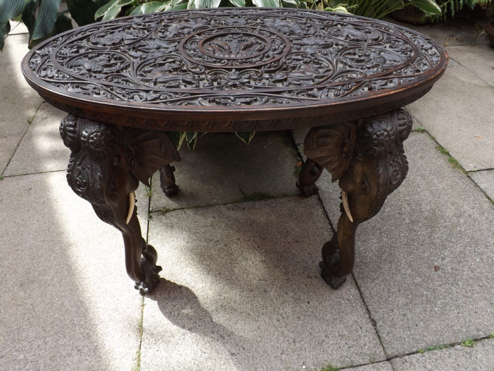 c19th carved teak indian or burmese oval elephant support table