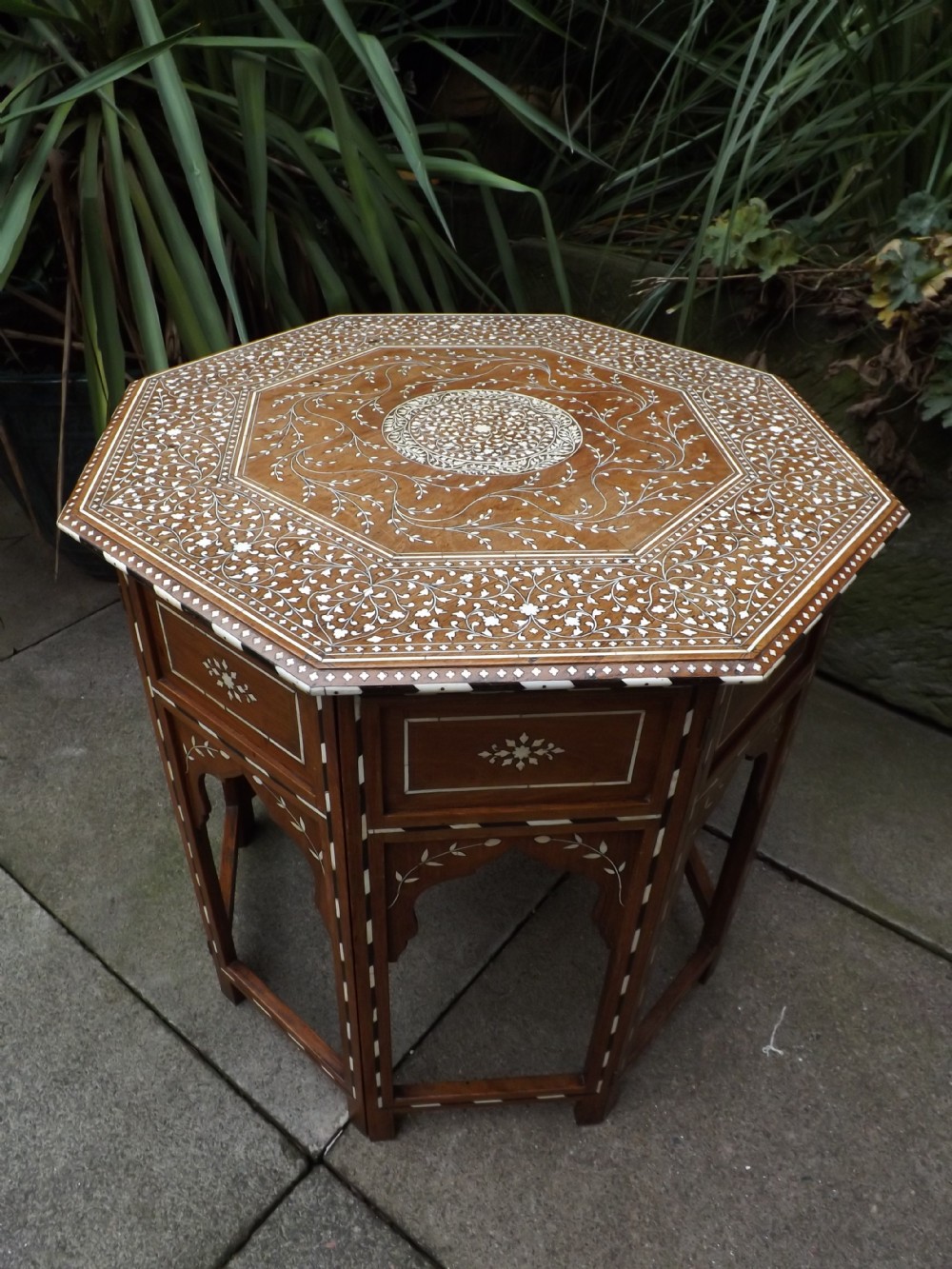late c19th indian ivoryinlaid 'shisham'indian rosewood octagonal table on hinged folding base