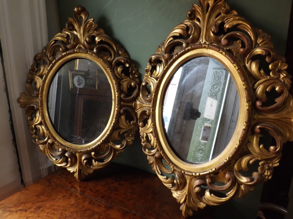 pair late c19th italian carved giltwood 'florentine' framed mirrors