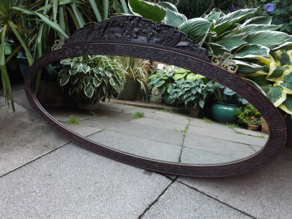 early c20th chinese carved hardwood frame oval mirror