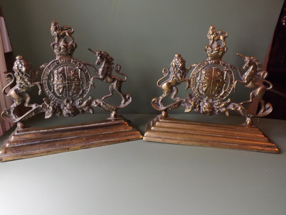 pair of c19th castbrass royalcoatofarms armorial doorstops