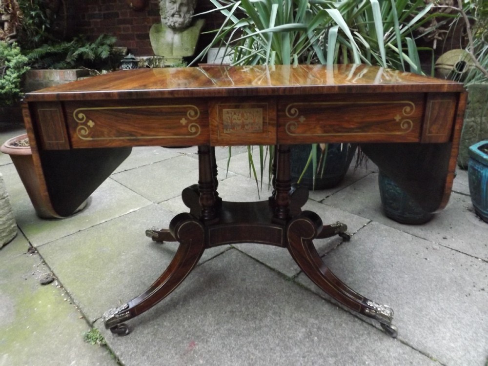early c19th regency period brassinlaid rosewood sofa table in the manner of george oakley