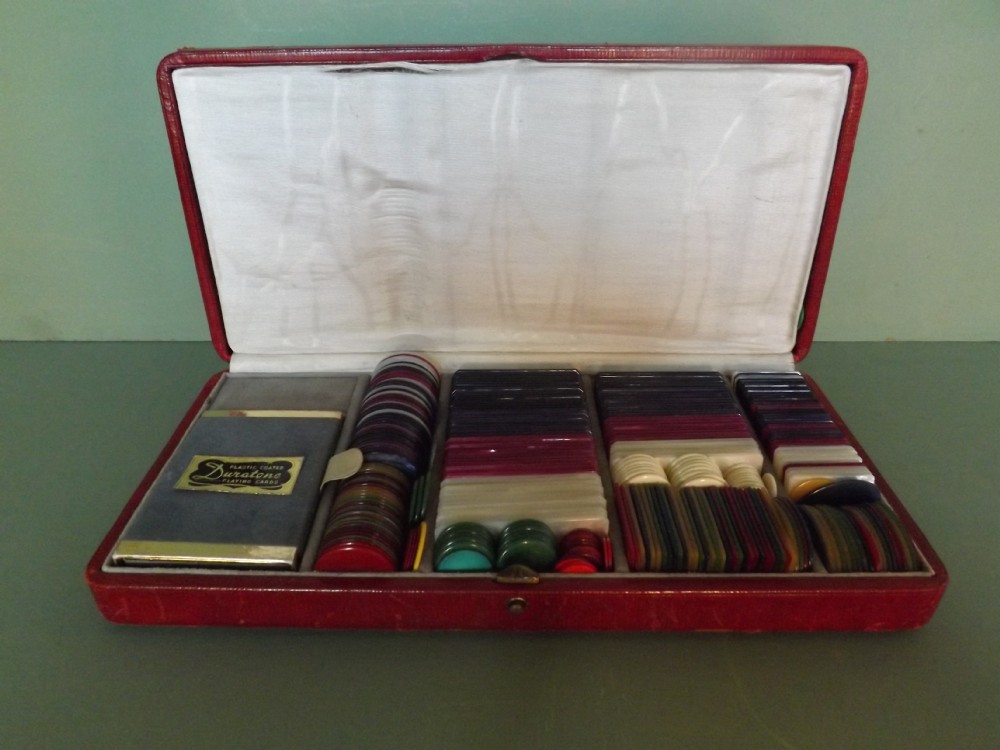 early c20th leathercased set of gamblingpoker chips