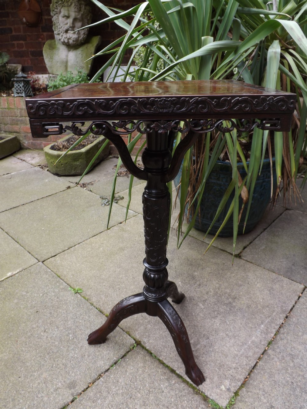 late c19th chinese carved hardwood tripod table of rare form