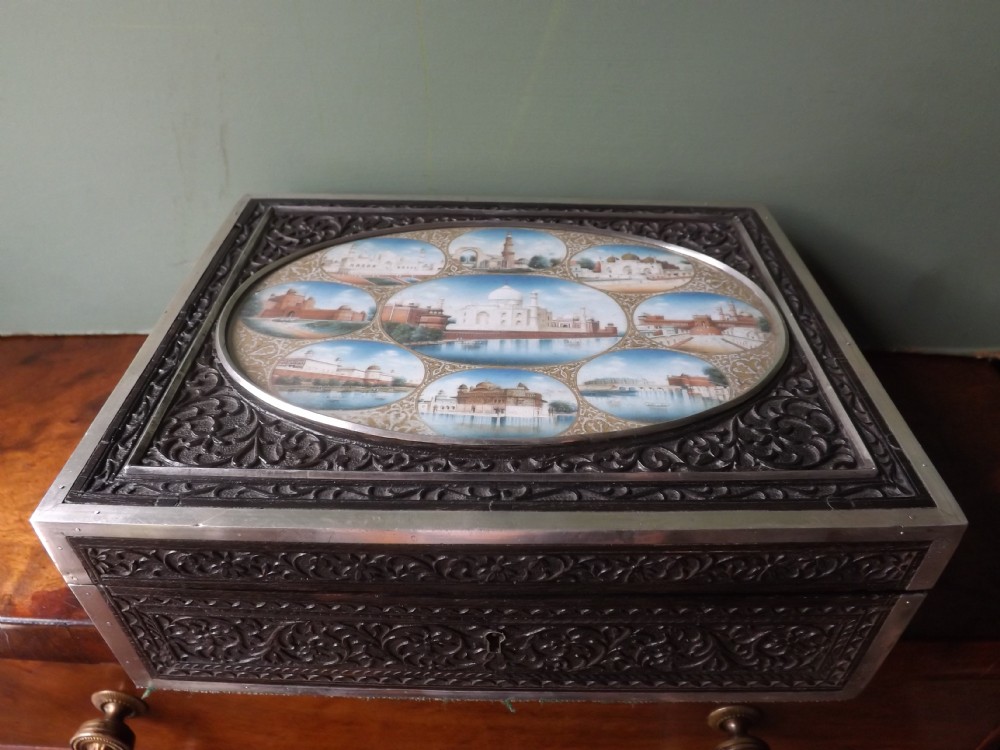 late c19th indian carved ebony casket with inset painted ivory panel of miniatures