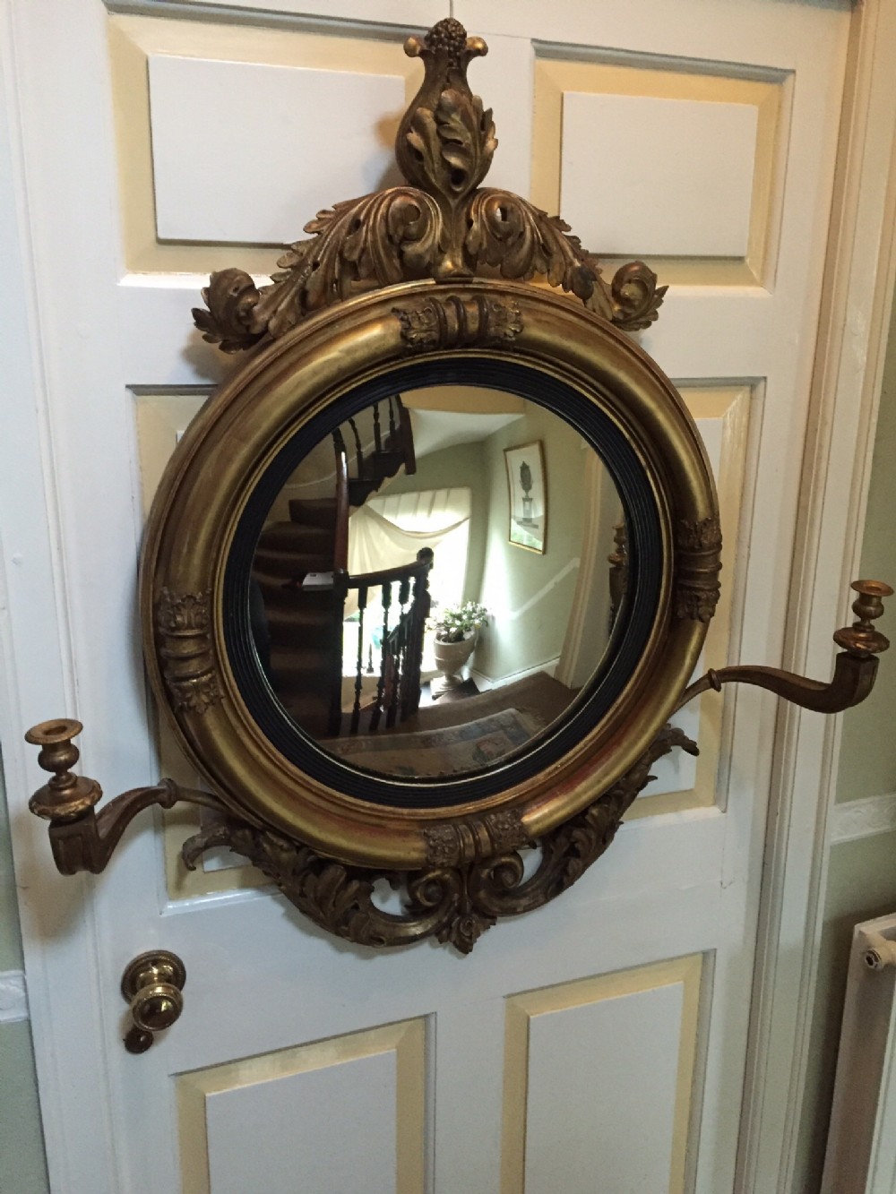 early c19th regency period carved giltwood framed 'girandole' convex plate mirror