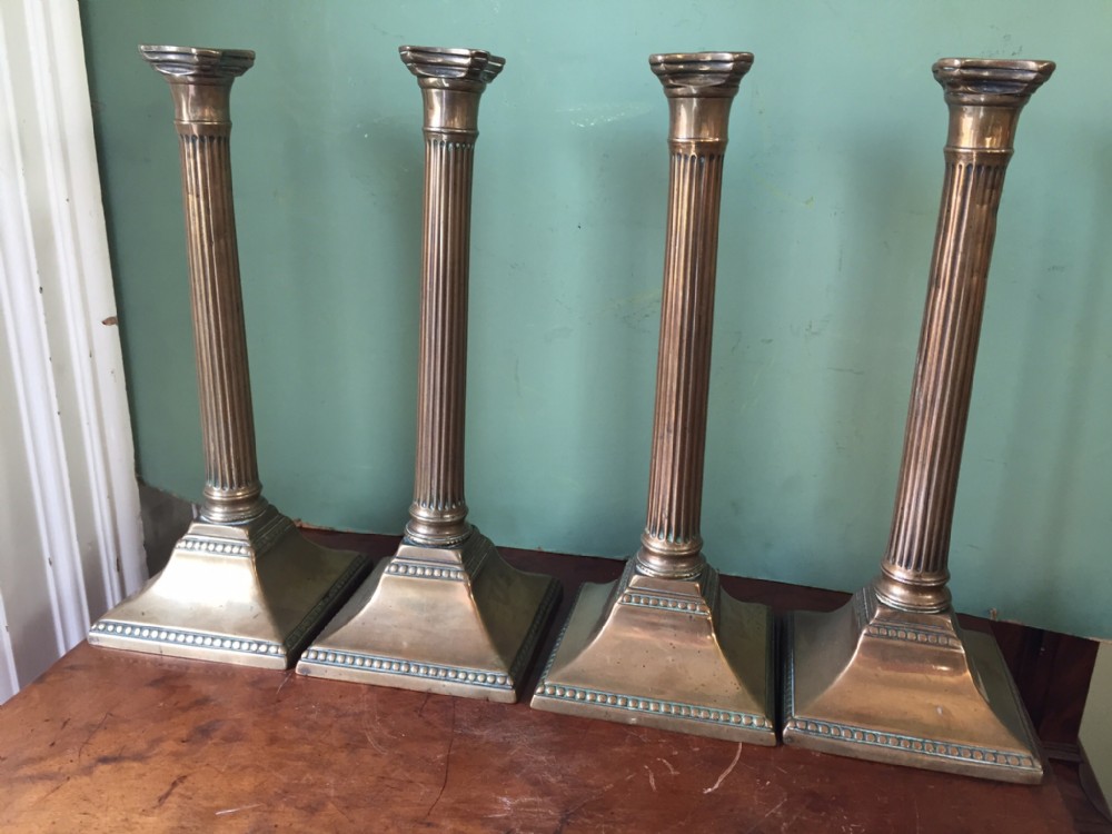 rare set of 4 c18th george iii period brass'bellmetal' reeded column candlesticks