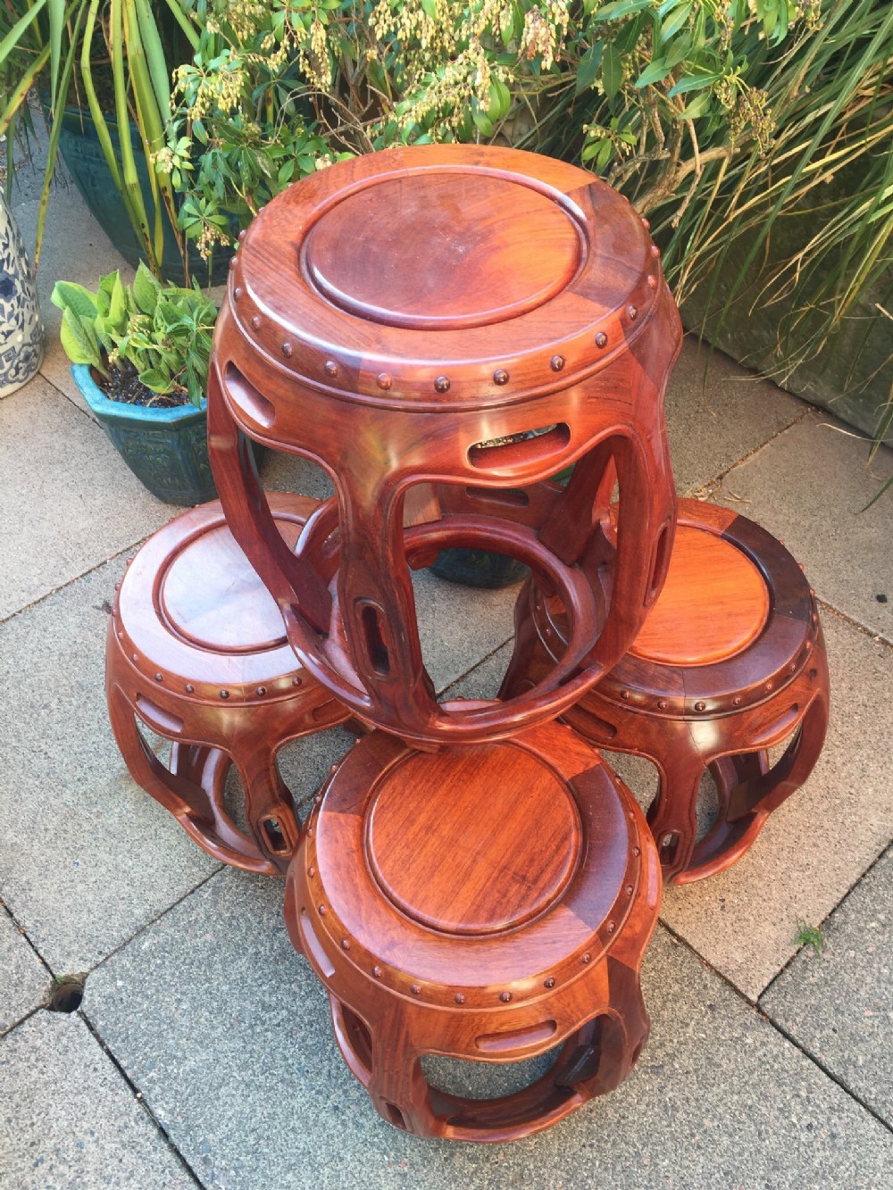 set of 4 c20th chinese design hardwood barrelshaped garden seats or side tables