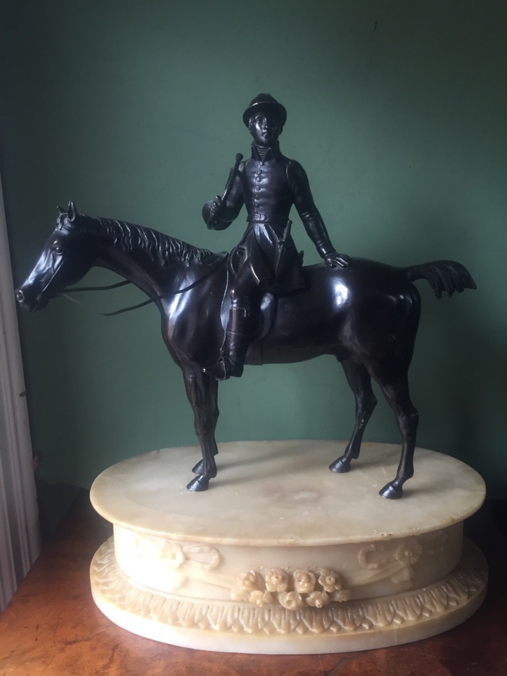 fine late c19th french equestrian bronze of a mounted huntsman on a carved ovoid alabaster plinth base