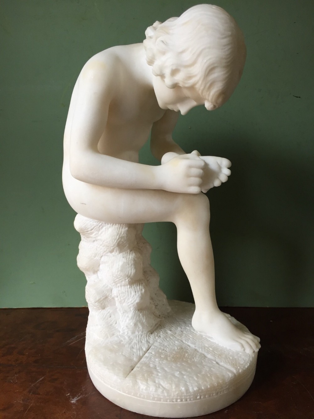 c19th italian carved alabaster 'grand tour' souvenir sculpture after the antique of spinario or the thorn puller