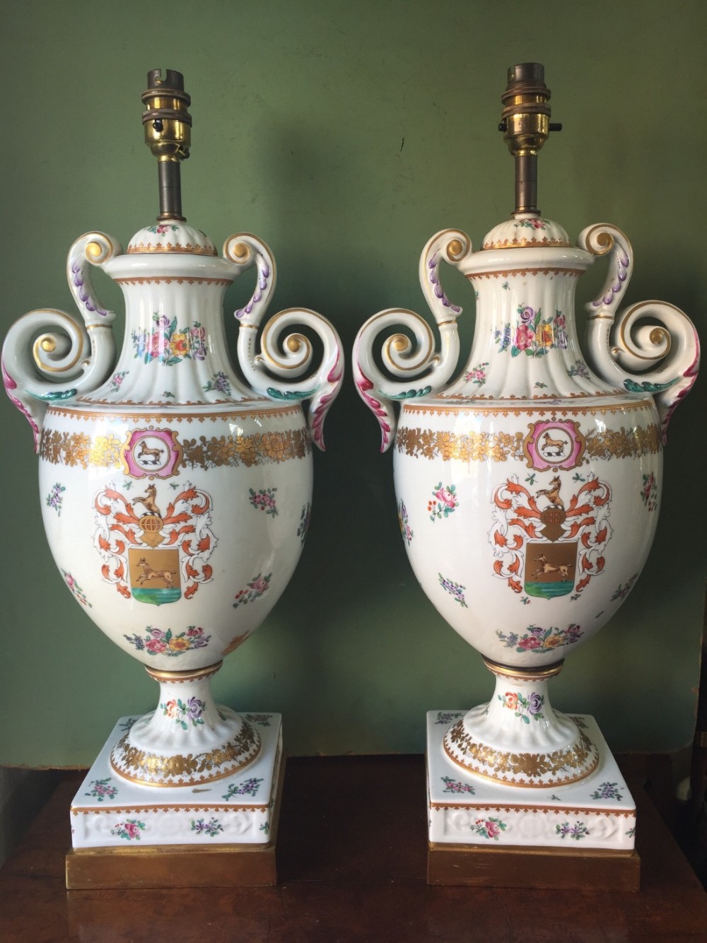 large pair of early c20th chinese armorial style porcelain lamps probably by samson of paris