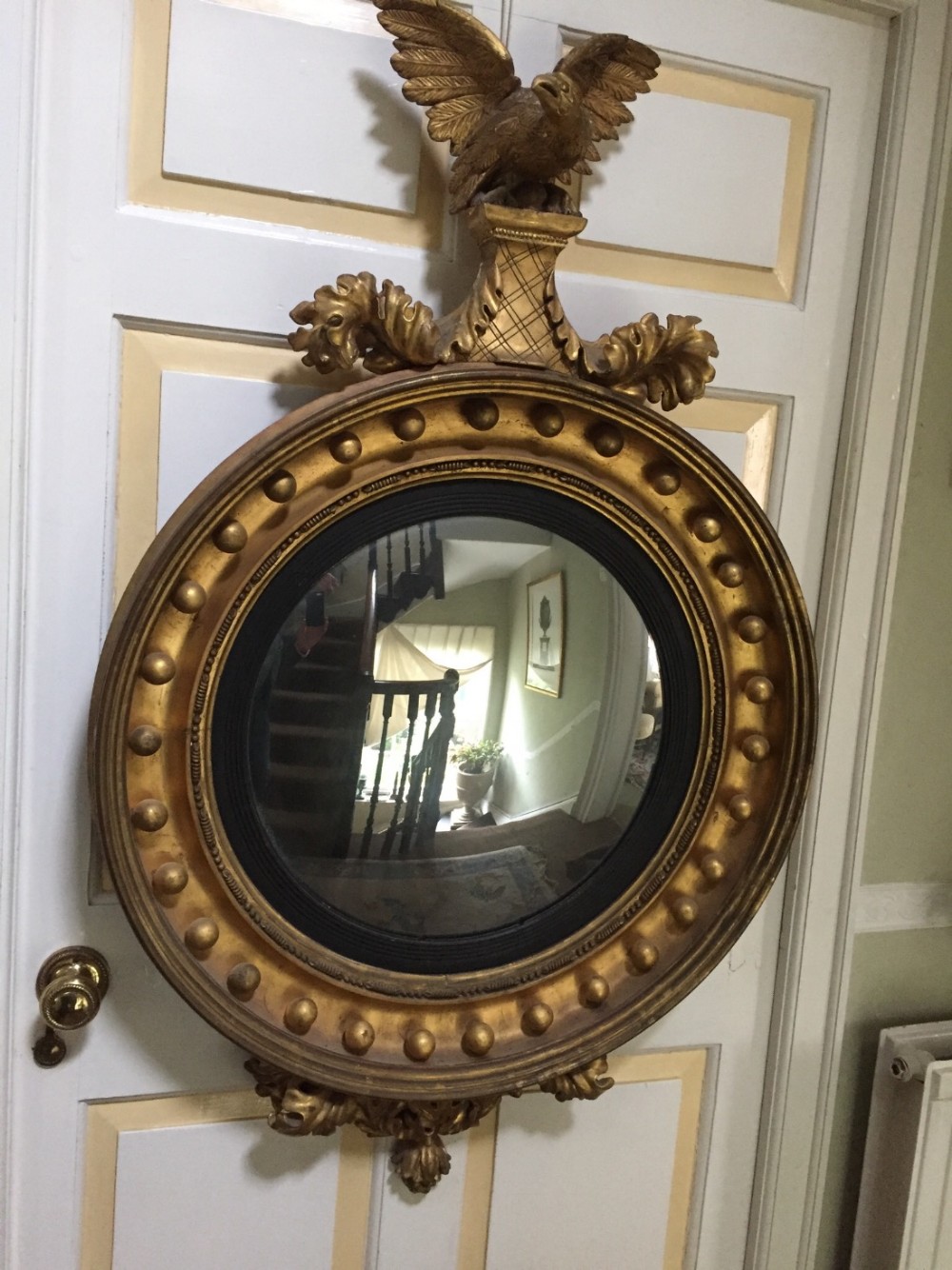 large early c19th regency period carved giltwood framed convex plate mirror