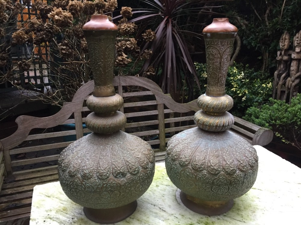 pair of late c19thearly c20th middle eastern probably egyptian or cairoware overscaled embossed brass bulbous lampbases