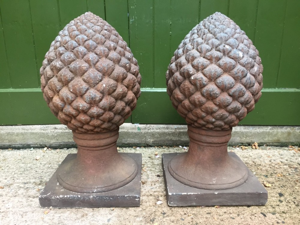 large pair of decorative late c19th cast stoneware or terracotta finials modelled as pine cones or acanthus flower buds