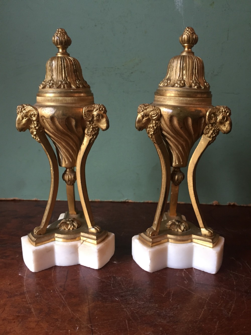 pair of c19th gilt bronze cassolettes of neoclassical design on white marble bases