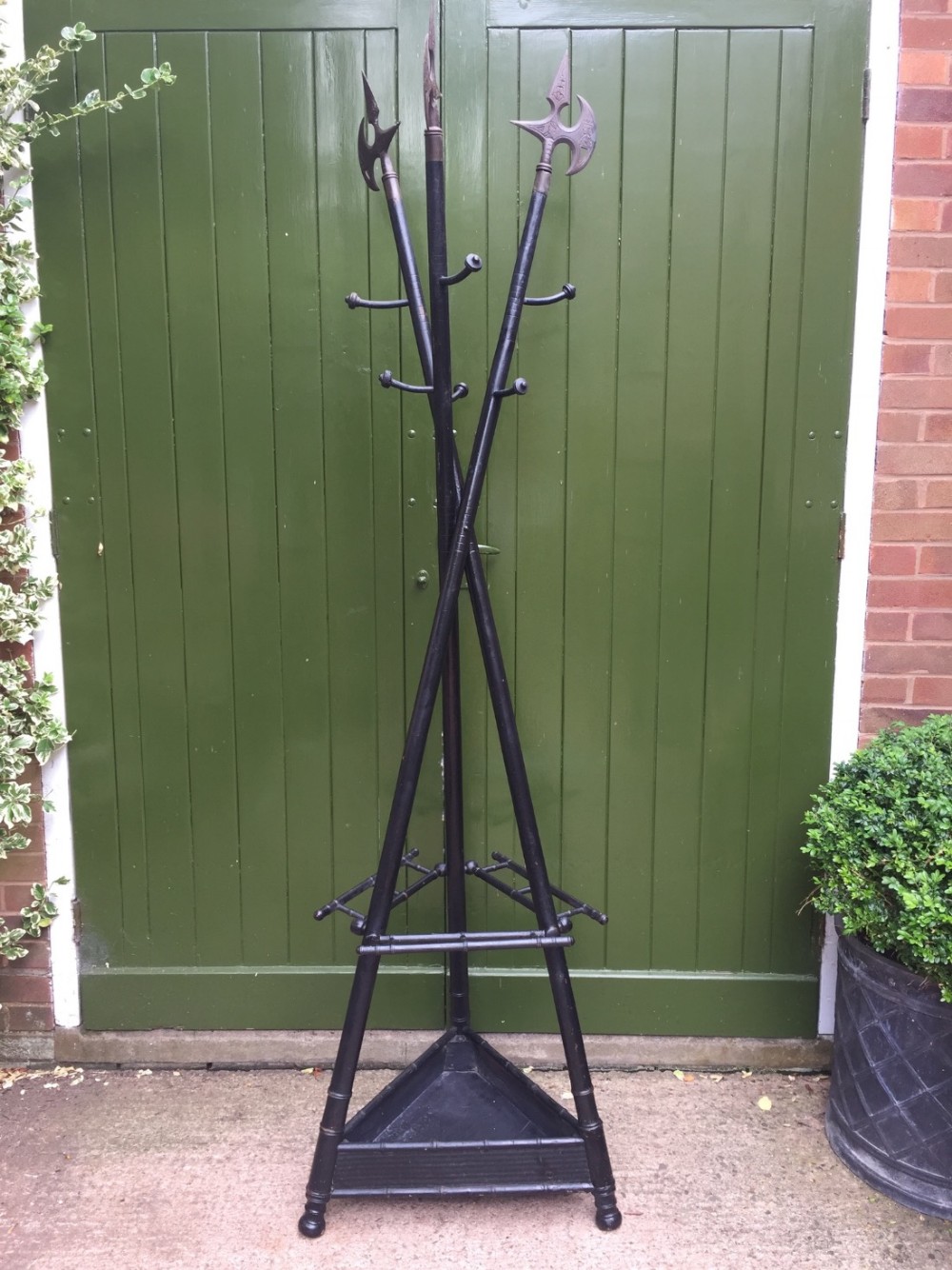 unusual and decorative late c19th french ebonised hat coat and stickstand formed as 3 crossed halberds or pikes