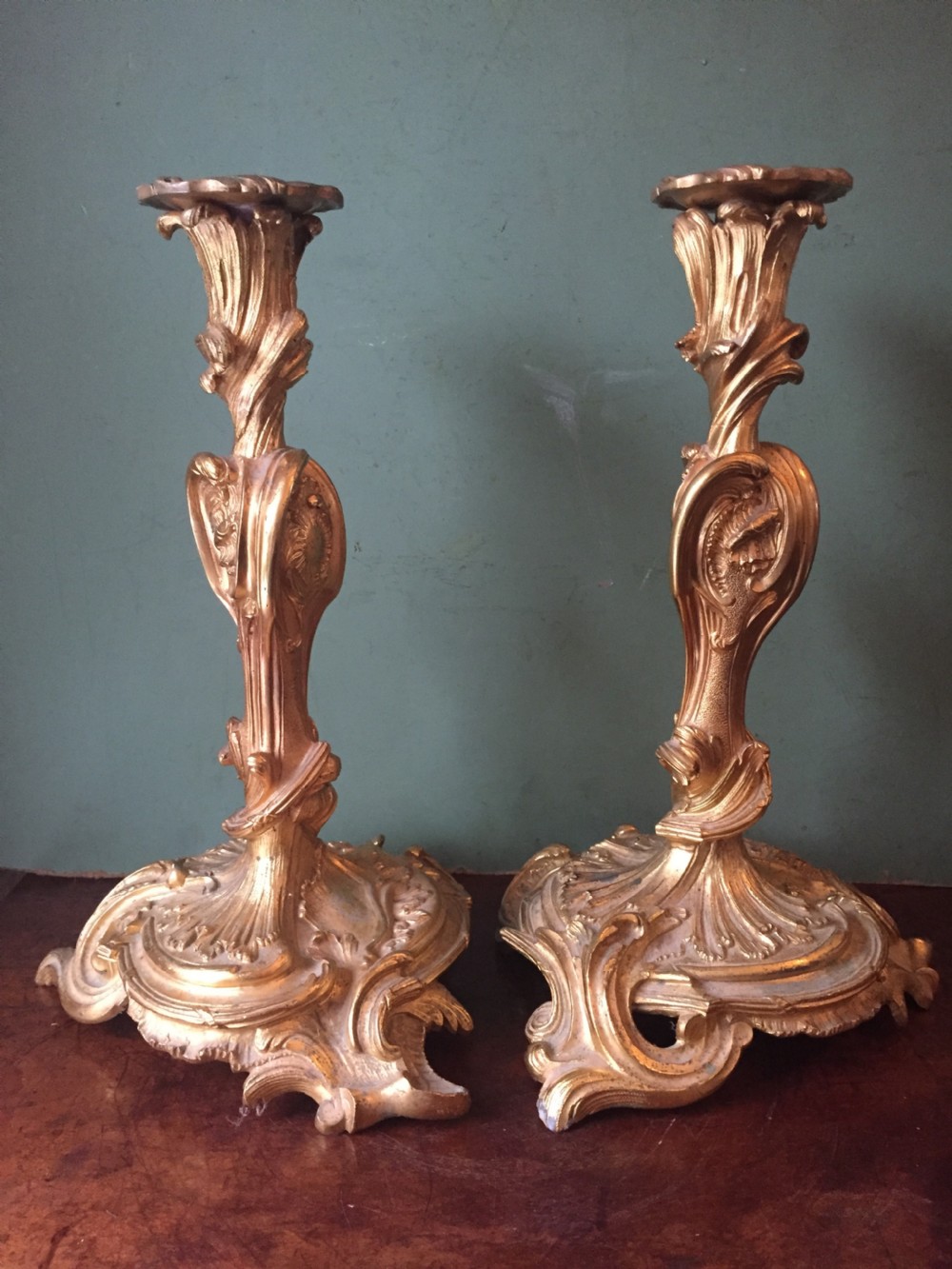 pair of mid c19th french ormolu bronze candlesticks of louis xvi rococo design