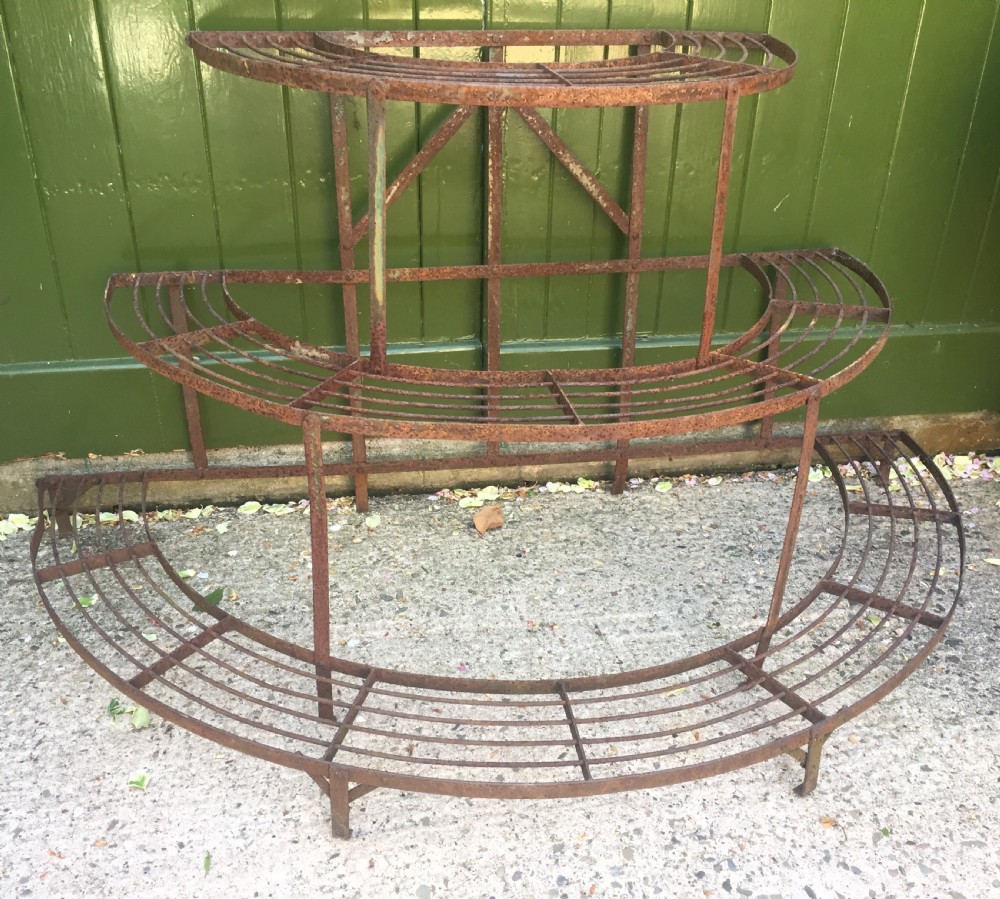 late c19th early c20th slatted wroughtiron conservatory orangery or garden plant stand of semicircular graduated form