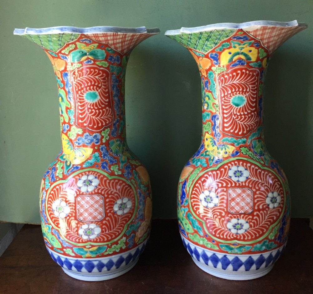 pair of late c19th japanese enamel decorated porcelain vases in stylised imari palette probably by fukagawa factory of tokyo