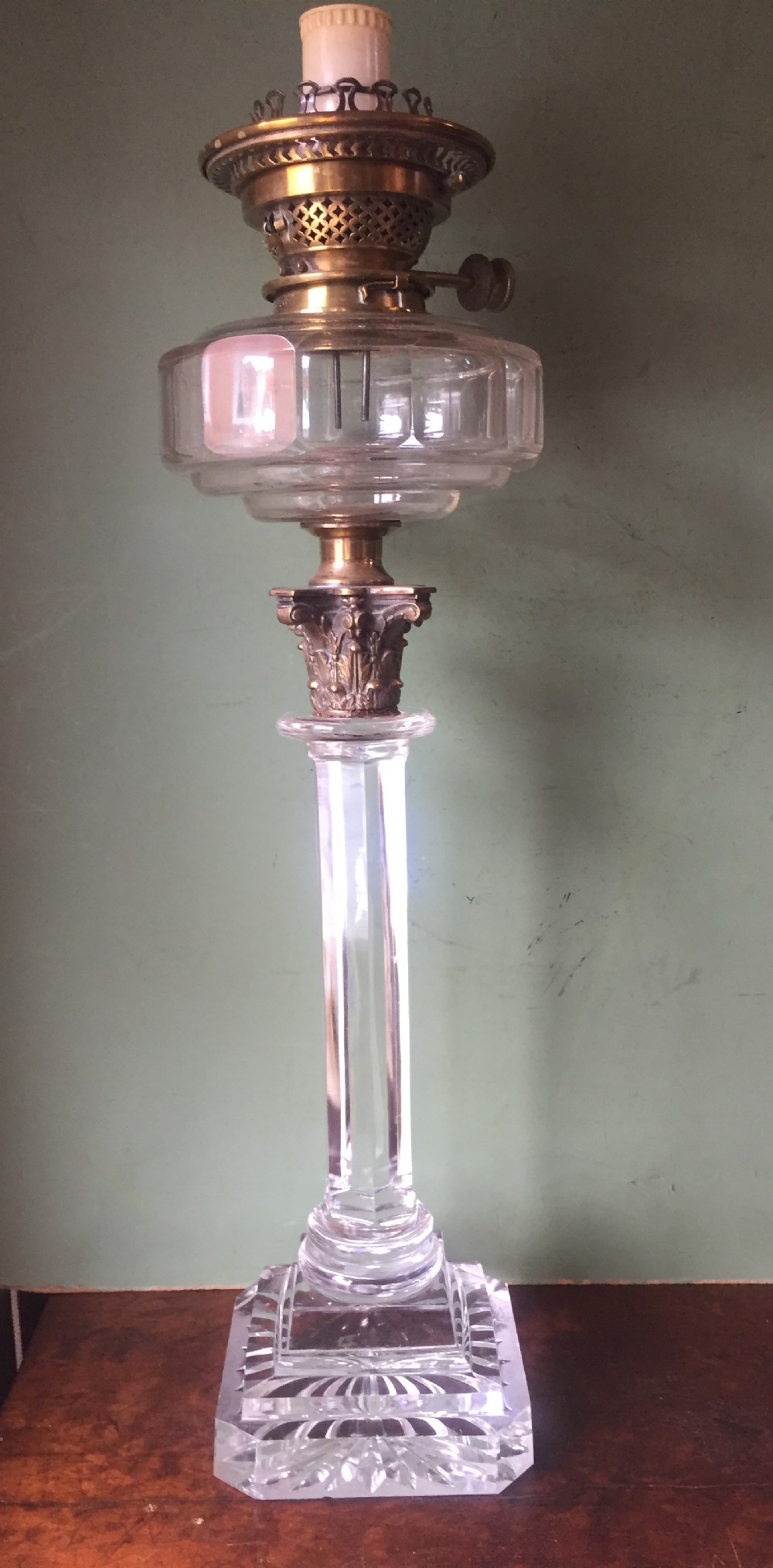 late c19th cutglass column oillamp by hinks with corinthian capital cast brass top now converted to electricity