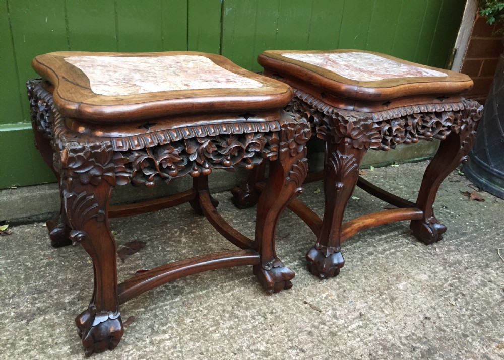 pair of late c19th chinese qing dynasty carved hardwood inset marble top low jardiniere stands or end tables