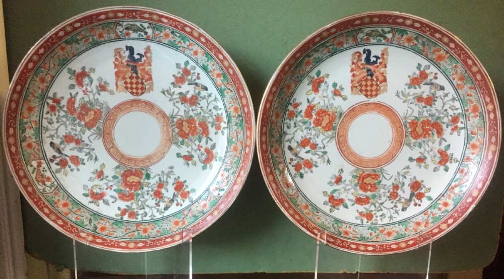 pair of c19th chinese style armorial porcelain dishes decorated in c18th style famille rose designs probably by samson paris