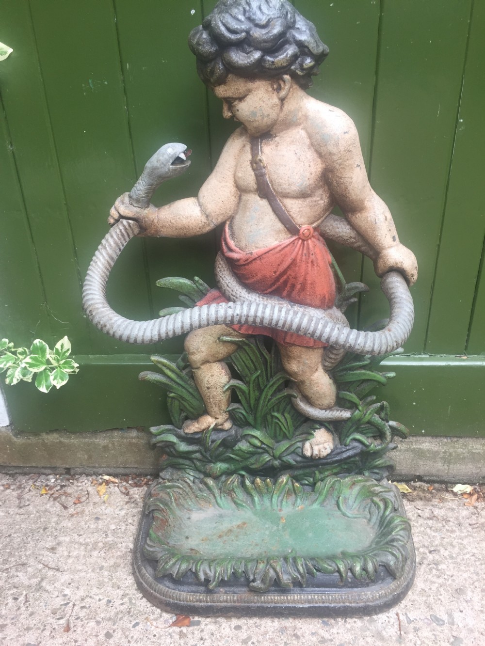 mid c19th castiron stickstand depicting the young hercules
