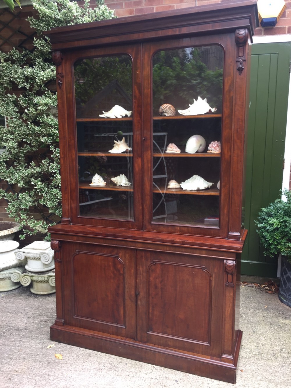 superior quality mid c19th mahogany library bookcase of broad proportions
