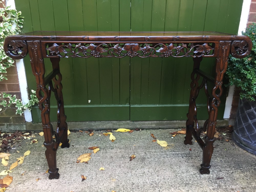 fine quality late c19th chinese qing dynasty carved hardwood scrollended 'altar' or console table of elegant proportions