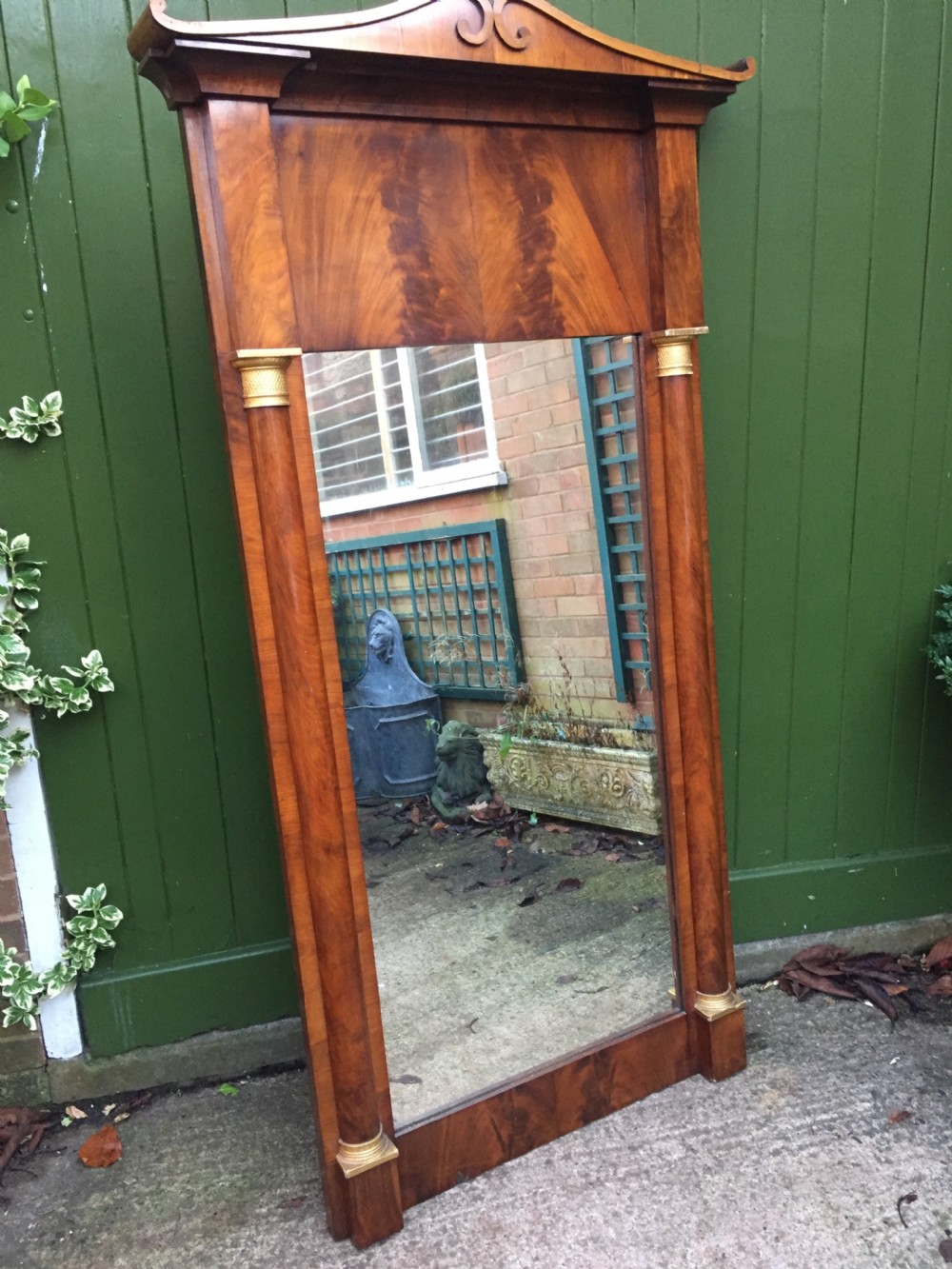 early c19th baltic region mahogany framed pier mirror with parcelgilt column caps and bases