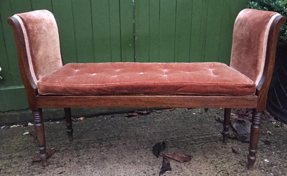 an elegant early c19th regency mahoganyframed windowseat of unusual form