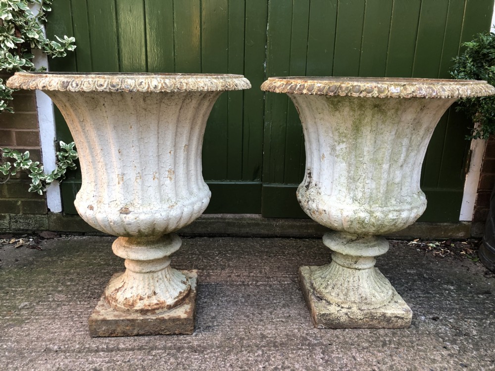 large scale pair of early c19th regency period castiron terrace or garden vases of campana form