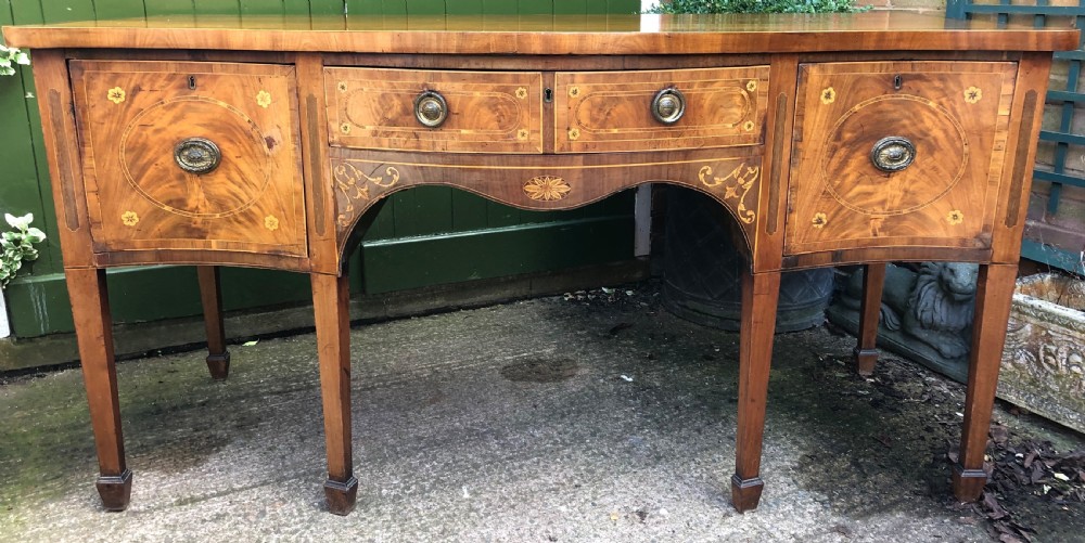 magnificent late c18th george iii period mahogany sideboard of serpentine outline with inlaid decoration