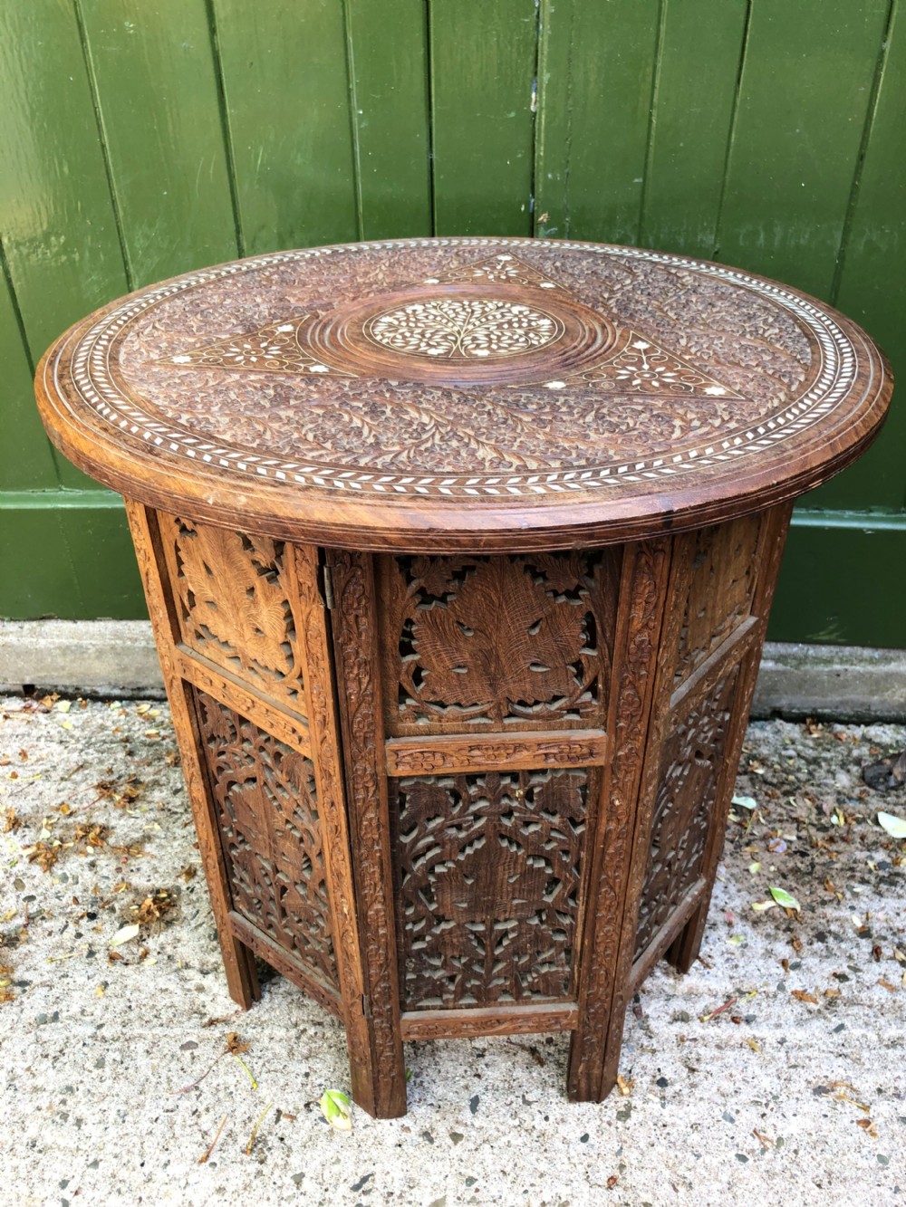 late c19th indian carved teak or shisham circular ivory inlaid table on octagonal folding base
