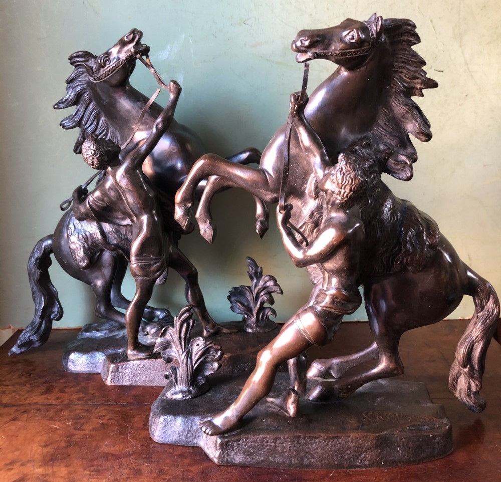 pair of mid c19th french bronze reduction sculptures of the marly horses