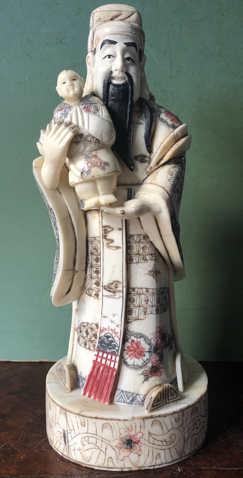 early c20th japanese carved bone okimono figure of an immortal or sage