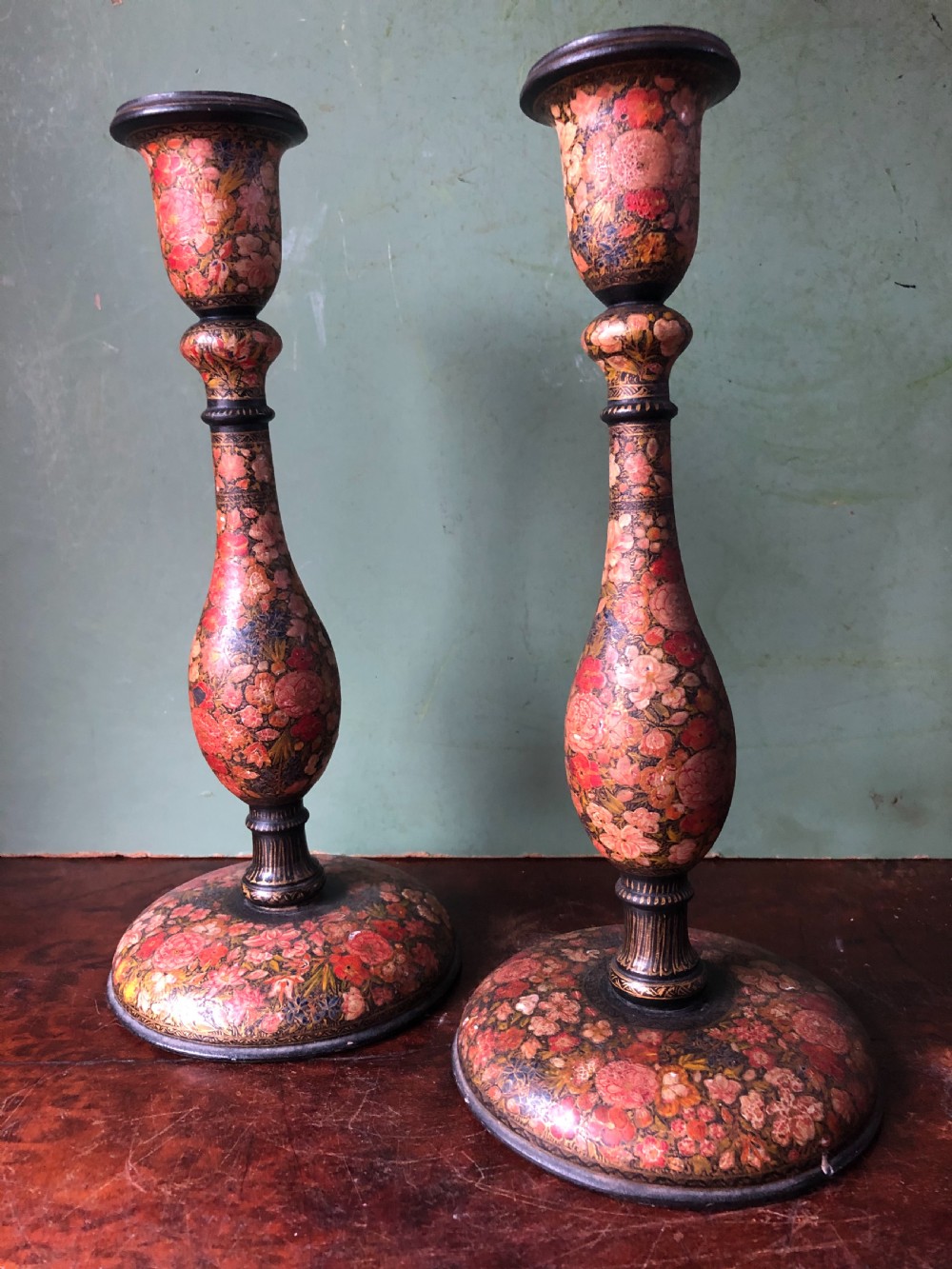pair of late c19th kashmiri indian papiermch candlesticks