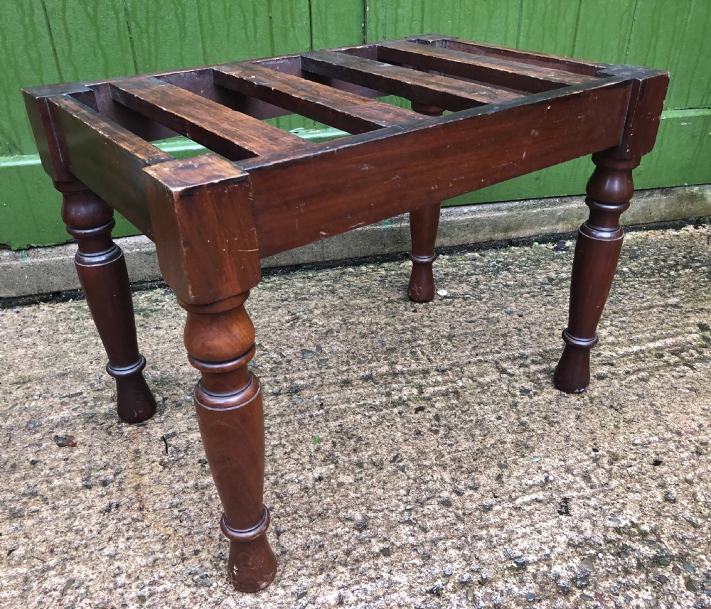 a late c19th mahogany luggage stand of robust construction