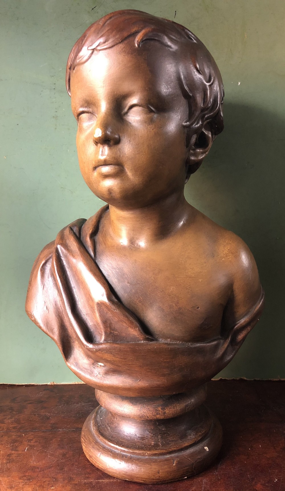 early c19th patinated plaster classicalstyle bust study of a young boy