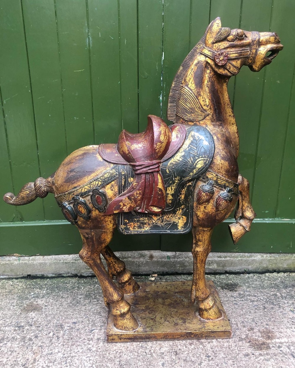 large early c20th chinese carved wood gilded and polychrome decorated study of a tang dynasty war horse