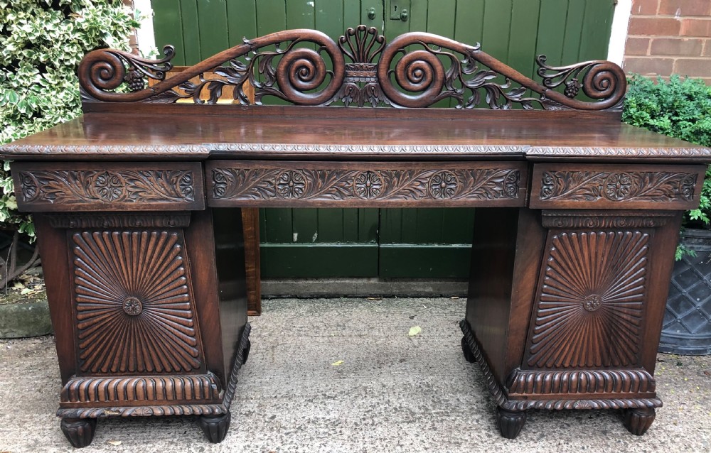 c19th angloindian carved padauk pedestal sideboard