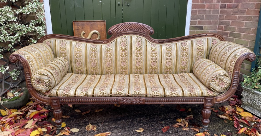 elegant early c19th regency period carved mahogany framed double scrollended sofa