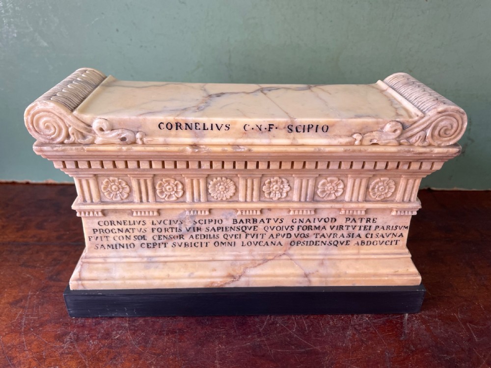fine early c19th italian grand tour souvenir carved giallo antico marble reduction of the sarcophagus of lucius cornelius scipio barbatus