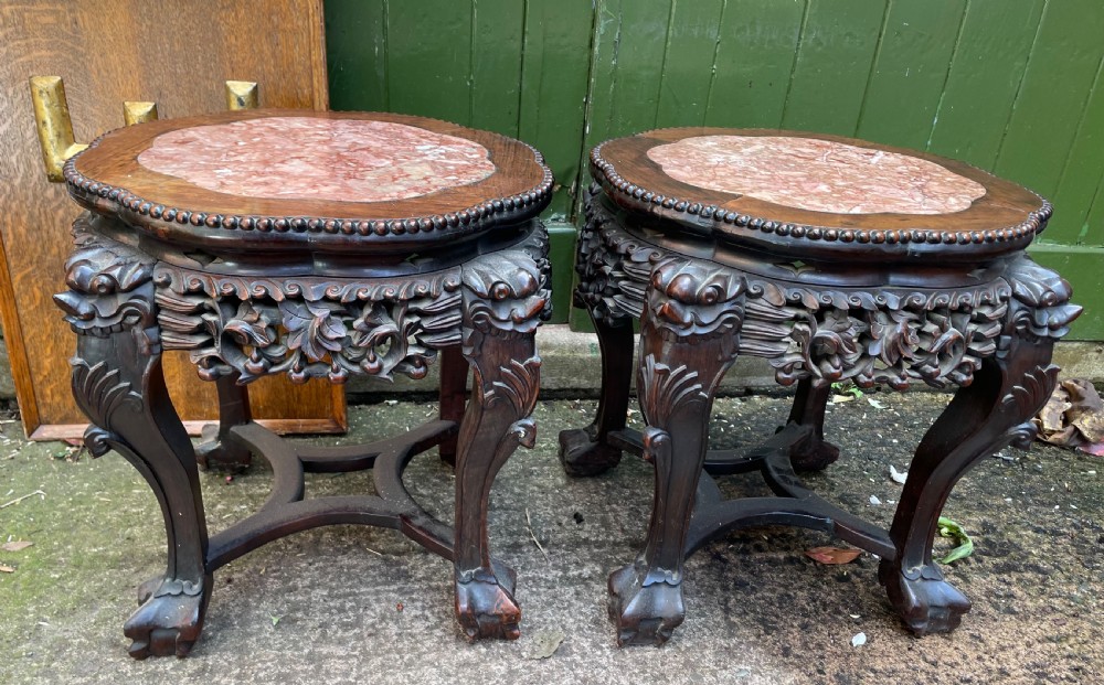 pair of late c19th chinese qing dynasty carved hardwood inset marble top low tables or jardiniere stands