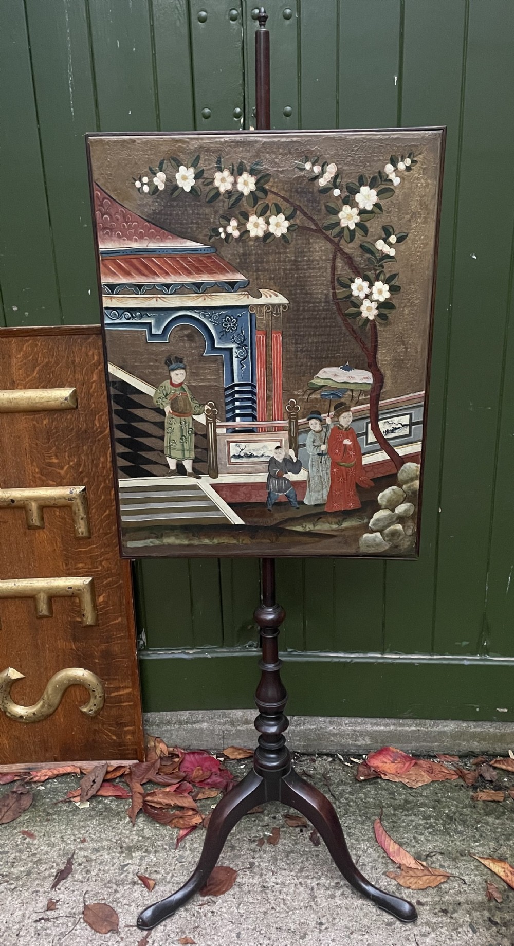 c18th mahogany polescreen mounted with a rectangular chinese painted oil on canvas panel