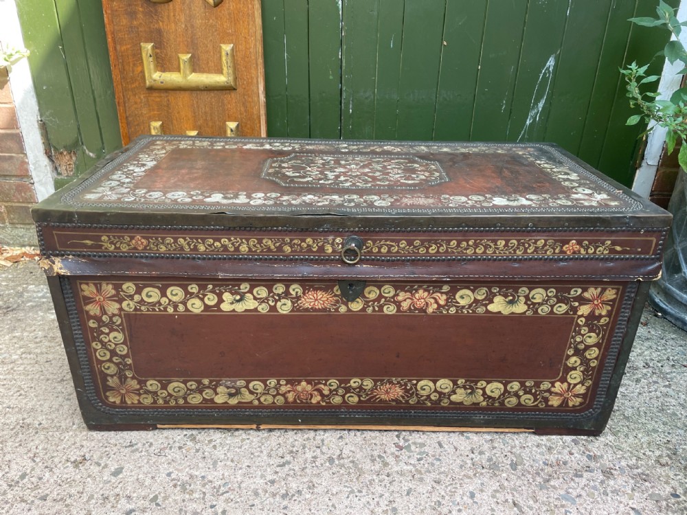 larger scale c19th chinese export trade leather and brassbound polychrome painted camphorwood trunk