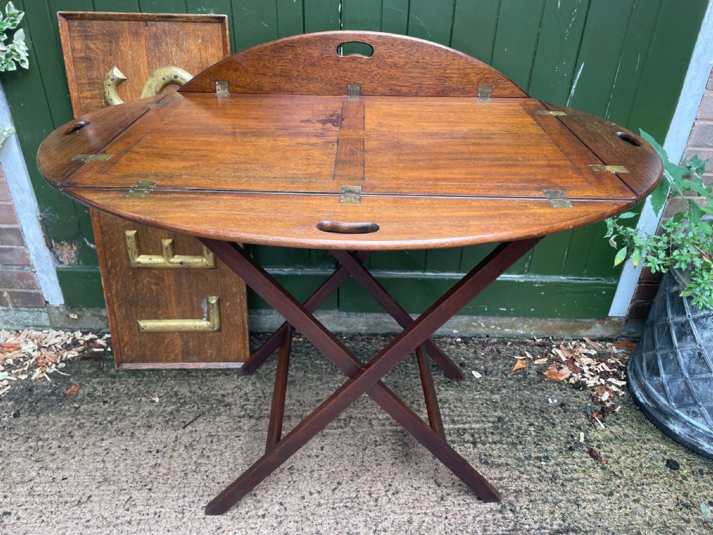 very large late c19th mahogany foldingsided oval butlers tray on an xframe stand