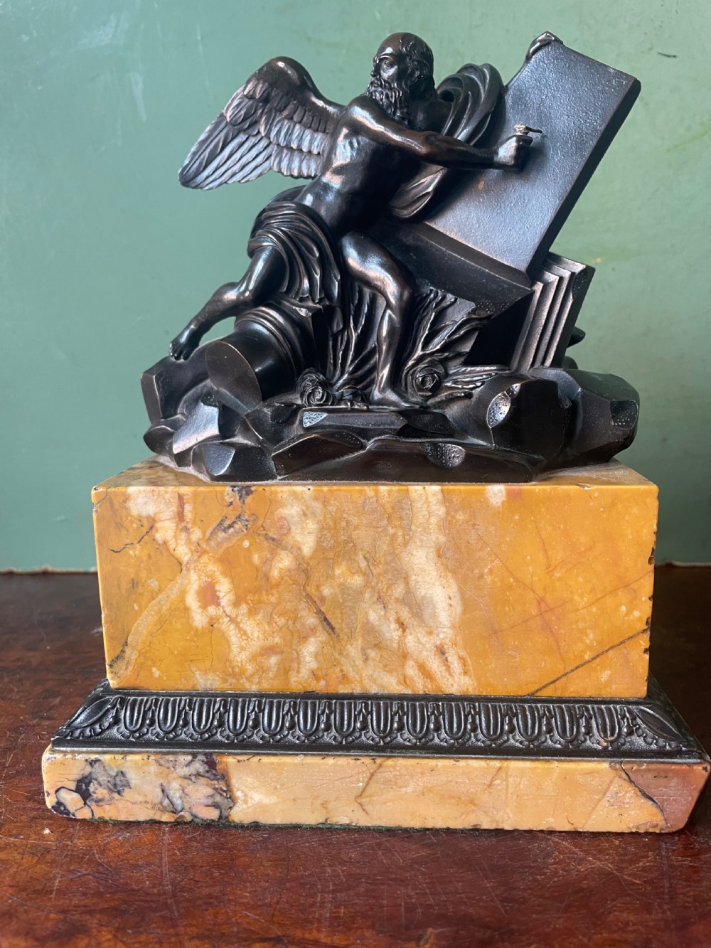 early c19th french classical bronze study mounted on a giallo di siena marble plinth base probably depicting chronos